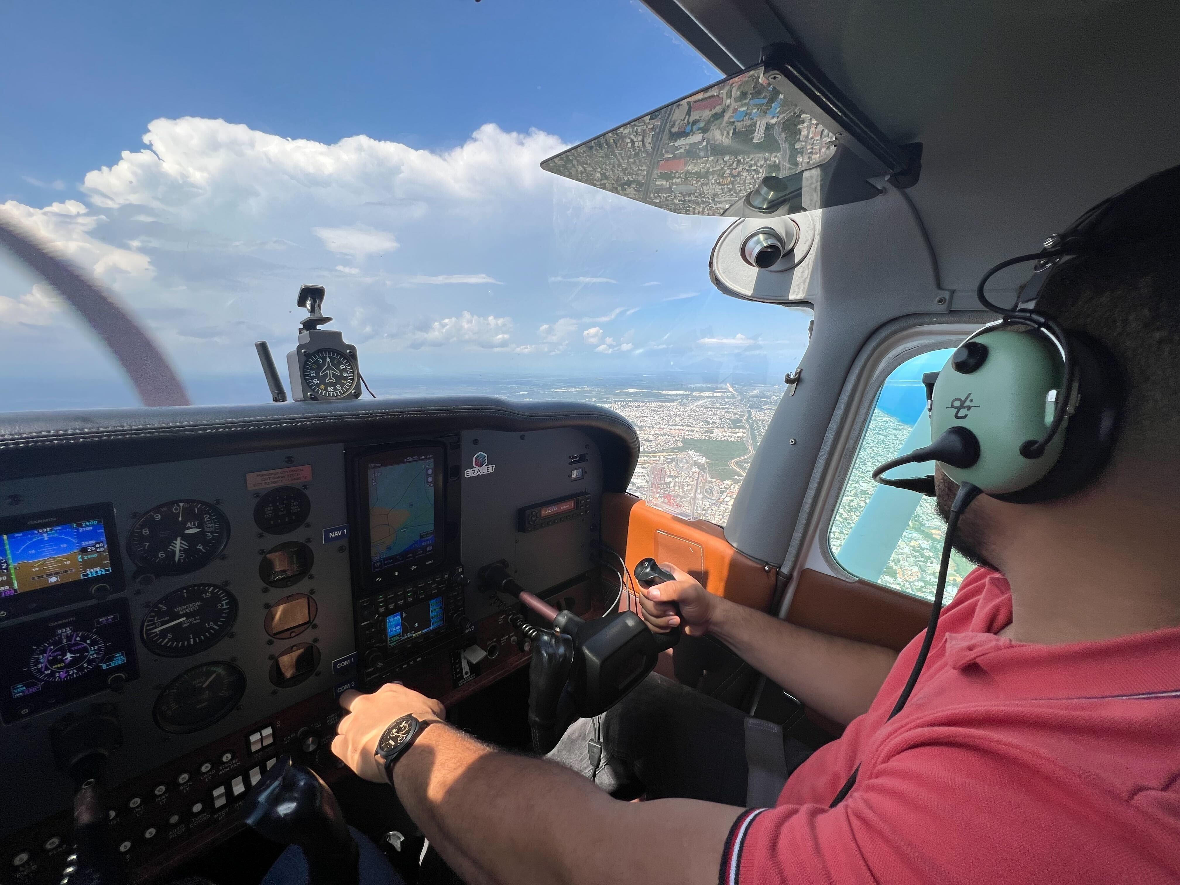 Byron Garrido flying a plane