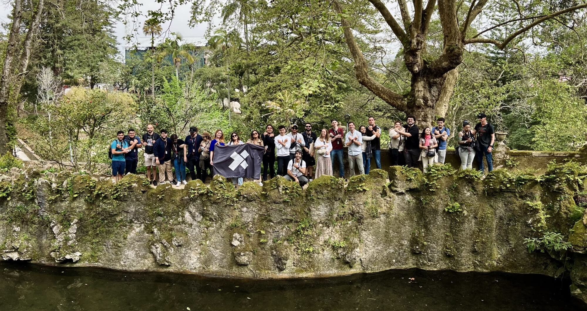 A group of X-Teamers near a river