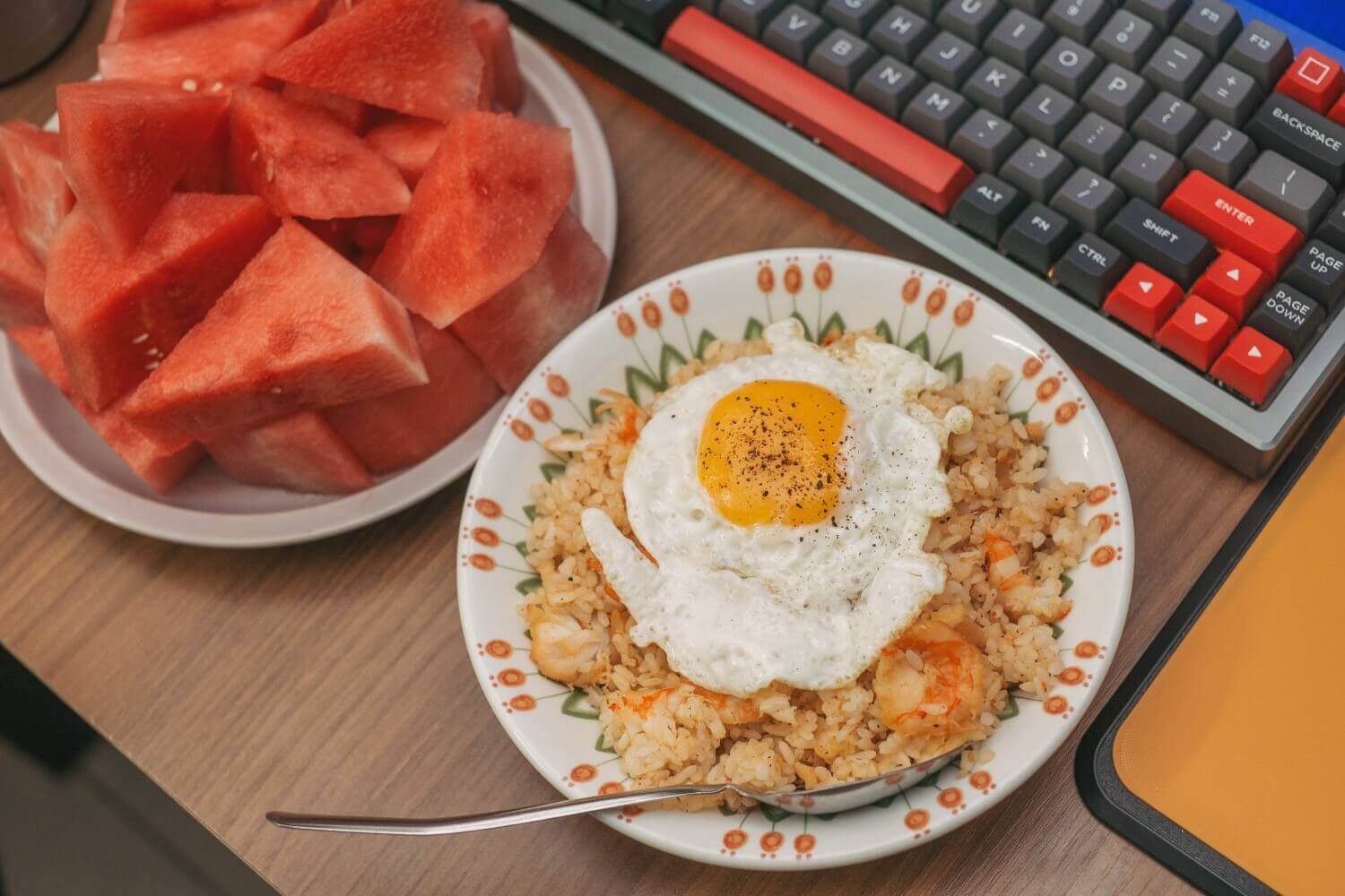 Keyboard with watermelon and egg fried rice